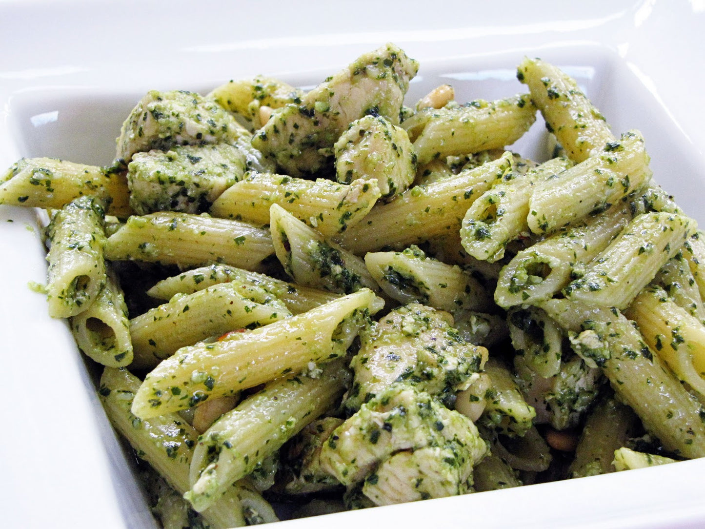 Penne with Pesto Sauce, Chicken, Mushrooms & Garlic Bread.